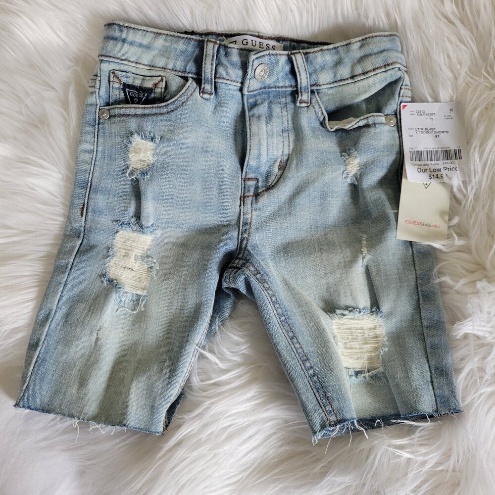 Guess denim shorts distressed.  Size 4T